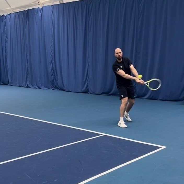 Alex MacDonald, founder of Soopaspace, coaching tennis
